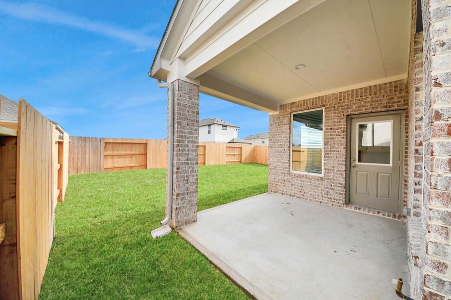 Exterior details and patio area of a home in River Ranch, Dayton (Image 3). Exterior details and patio area of a home in River Ranch, Dayton (Image 3).