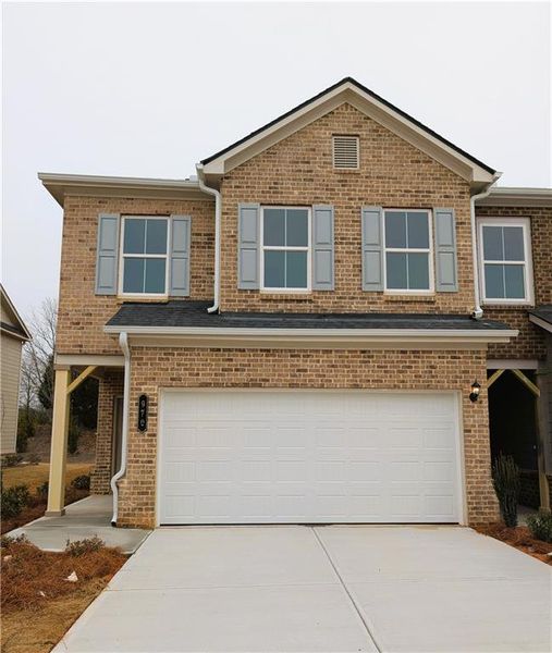 Front exterior of a new home in , Dacula, GA, highlighting curb appeal (Image 1). Front exterior of a new home in , Dacula, GA, highlighting curb appeal (Image 1).