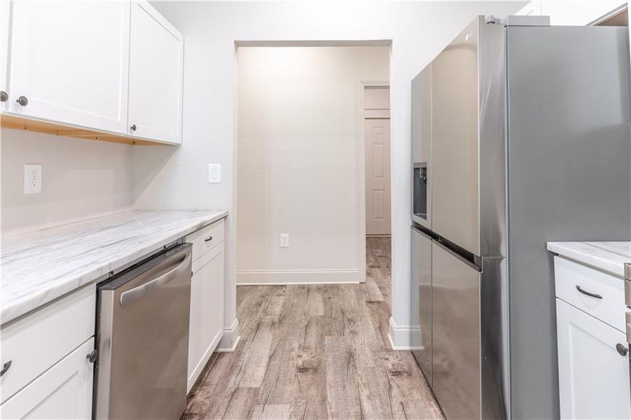 Furnished interior view inside a new home in , Commerce (Image 10).