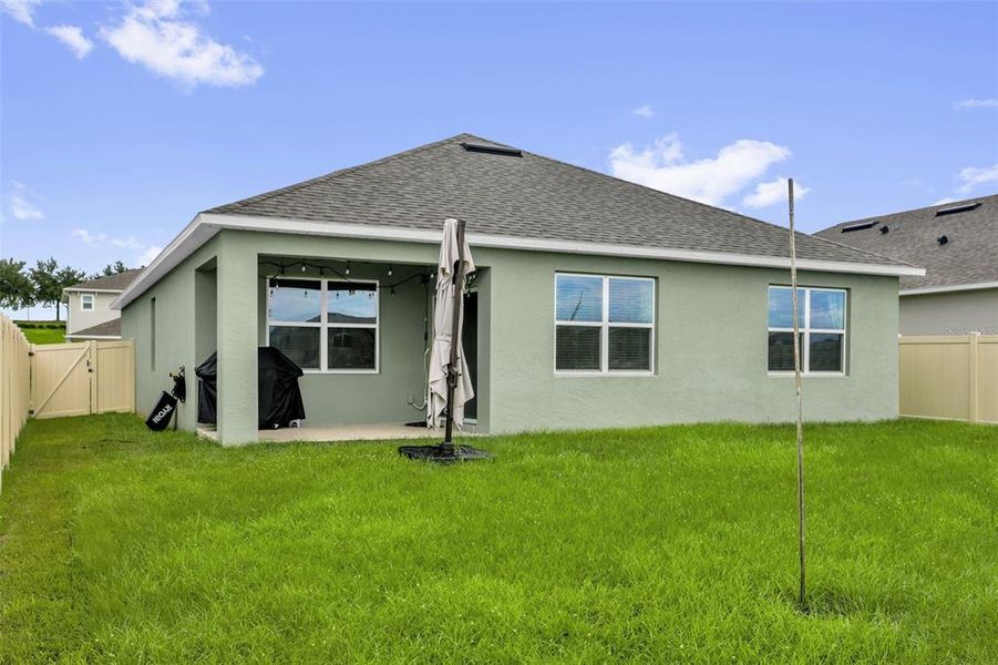 Exterior details and patio area of a home in Timberwalk, Mount Dora (Image 23).