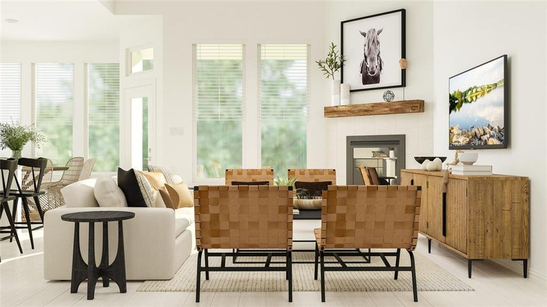 Living area with wood-type flooring and a tiled fireplace