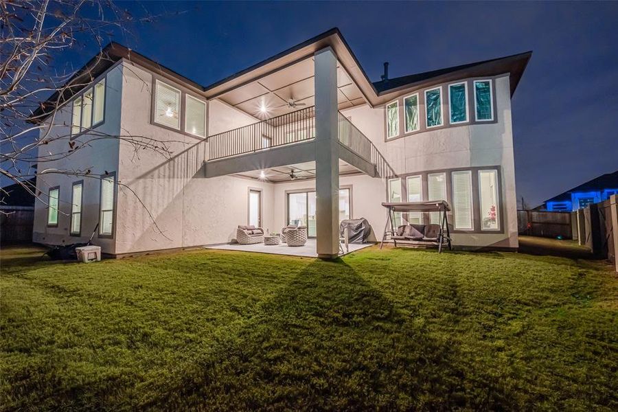 Covered patio with paneled ceiling, ceiling fan, and gas connections – perfect for future outdoor kitchen plans!