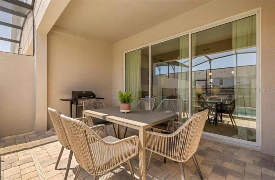 Exterior details and patio area of a home in , Kissimmee (Image 3).
