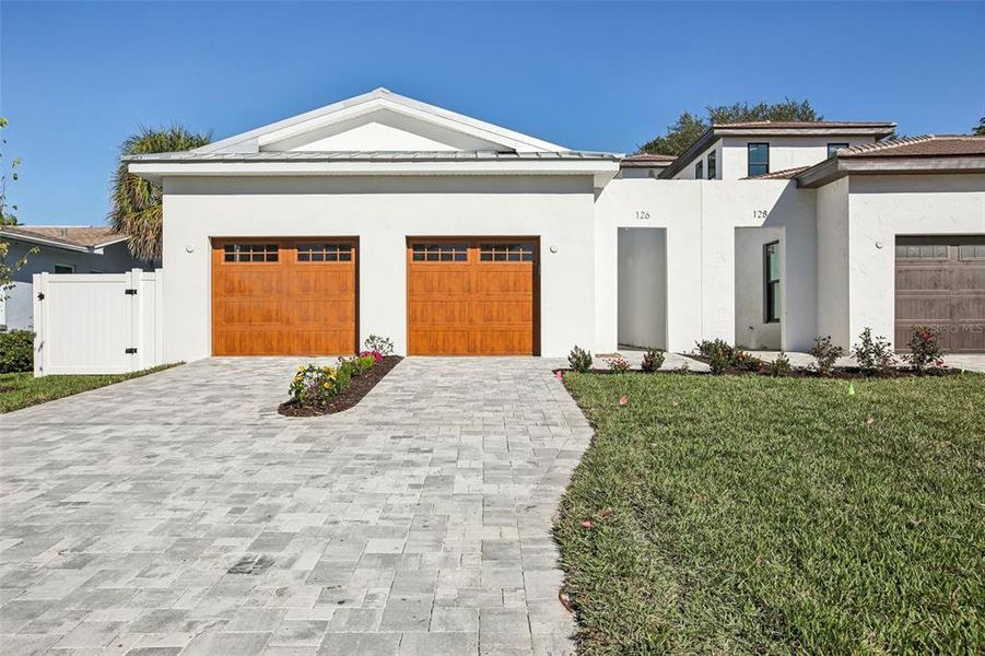 Front exterior of a new home in , St. Petersburg, FL, highlighting curb appeal (Image 30). Front exterior of a new home in , St. Petersburg, FL, highlighting curb appeal (Image 30).