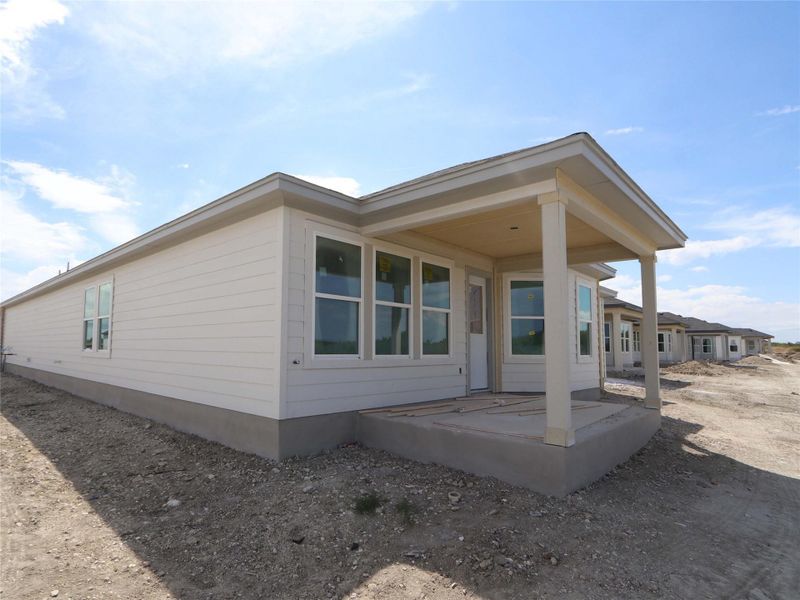 Exterior details and patio area of a home in Marble Creek Crossing, Austin (Image 2). Exterior details and patio area of a home in Marble Creek Crossing, Austin (Image 2).