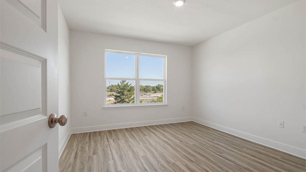 Representative unfurnished interior of a home built from the Monroe by D.R. Horton in Sanctuary Beach, Panama City Beach (Image 36).