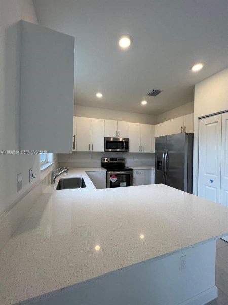 Furnished interior view inside a new home in , Coral Springs (Image 7). Furnished interior view inside a new home in , Coral Springs (Image 7).