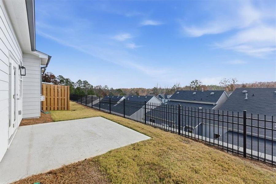 Exterior details and patio area of a home in Lakeside at Great Sky, Canton (Image 4).