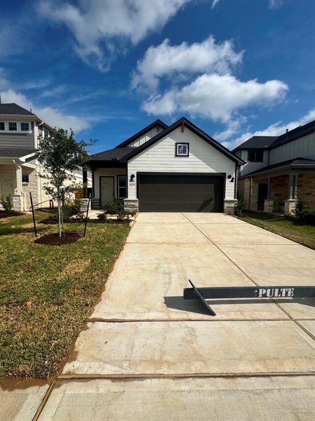 Front exterior of a new home in Ellerden, Tomball, TX, highlighting curb appeal (Image 2). Front exterior of a new home in Ellerden, Tomball, TX, highlighting curb appeal (Image 2).