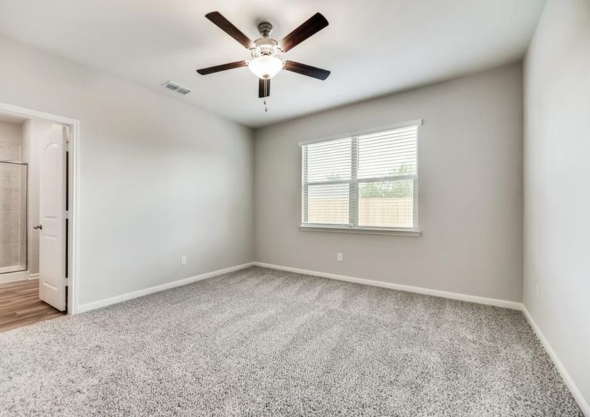 The master suite comes completed with a large window and ceiling fan kit.