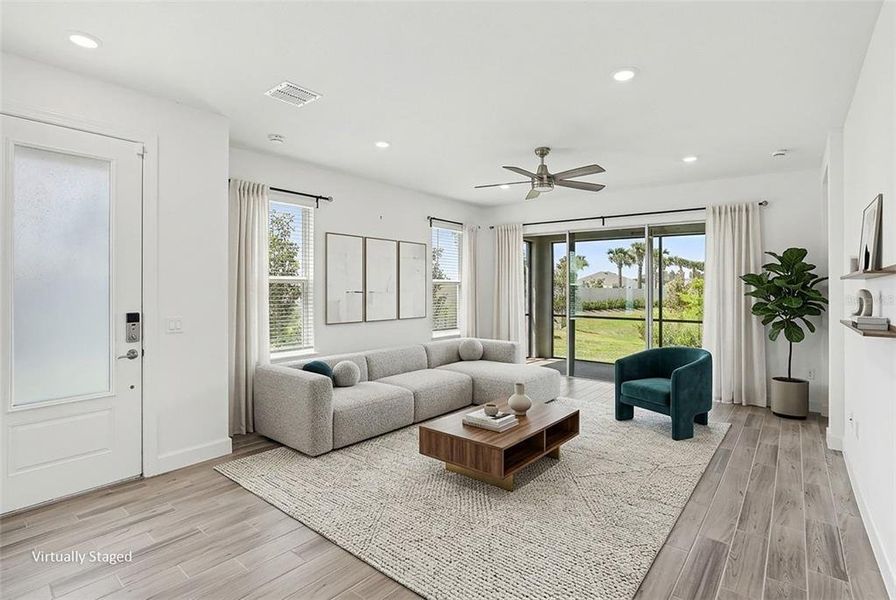Furnished interior view inside a new home in Center Lake Ranch Community Group Page, St. Cloud (Image 5).