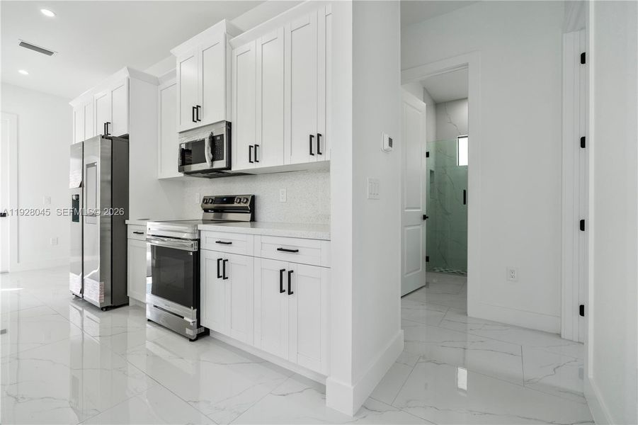 Furnished interior view inside a new home in , Lehigh Acres (Image 10).