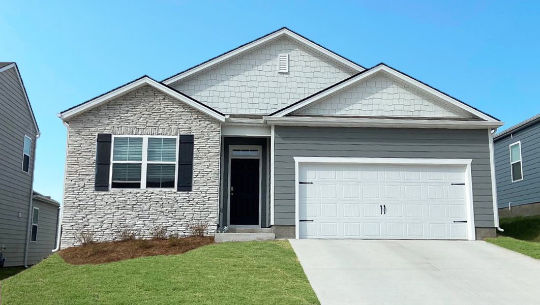 Front exterior of a new home in Woodbridge Glen Single Family, Lebanon, TN, highlighting curb appeal (Image 1). Front exterior of a new home in Woodbridge Glen Single Family, Lebanon, TN, highlighting curb appeal (Image 1).
