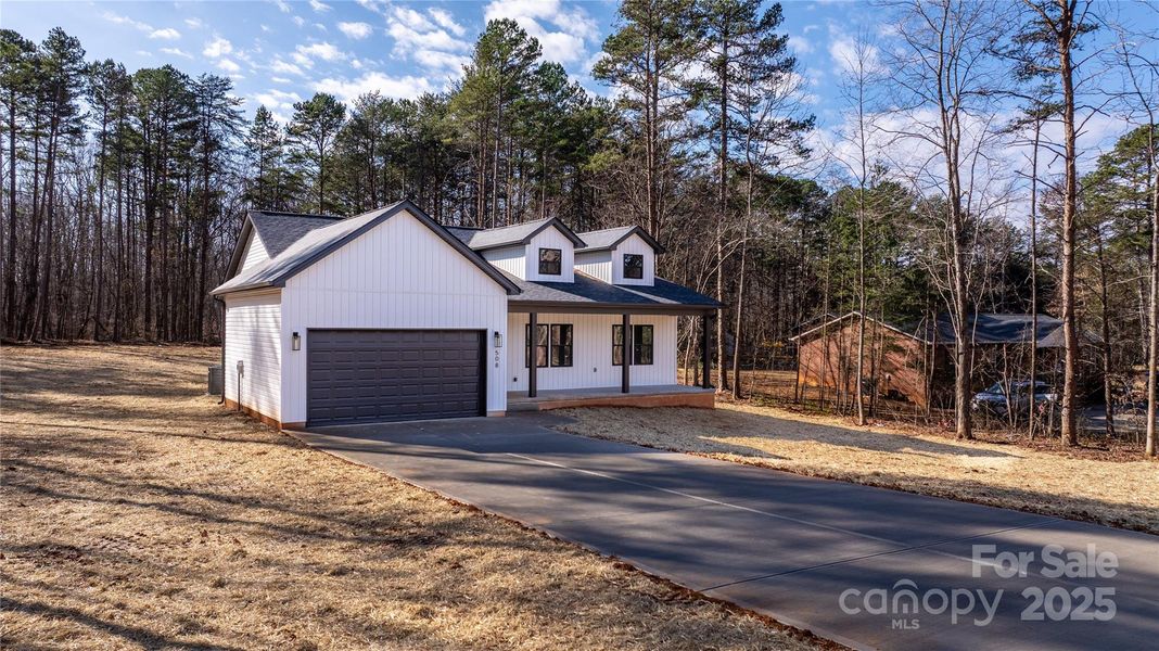 Front exterior of a new home in , Lincolnton, NC, highlighting curb appeal (Image 27).