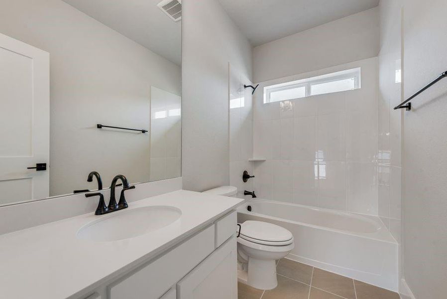 Furnished interior view inside a new home in Trails at Cottonwood Creek, Fate (Image 8).