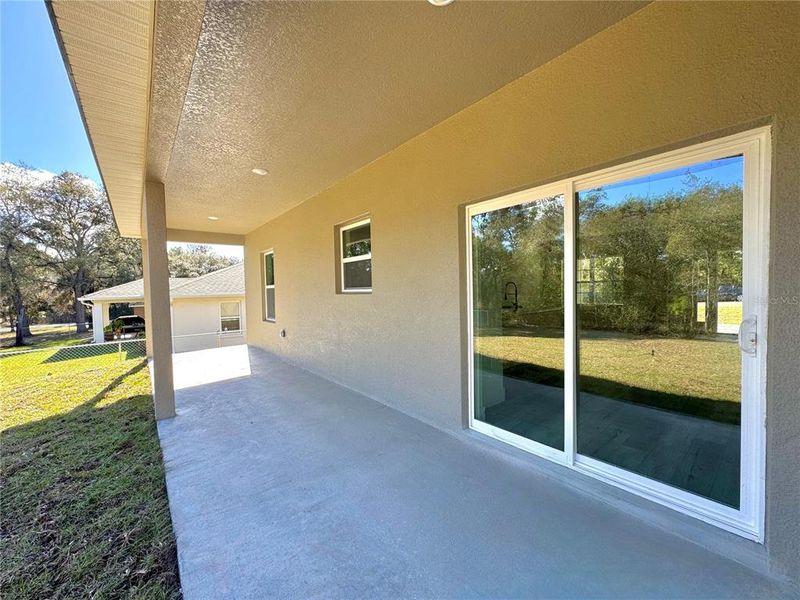 Exterior details and patio area of a home in , Citrus Springs (Image 19).