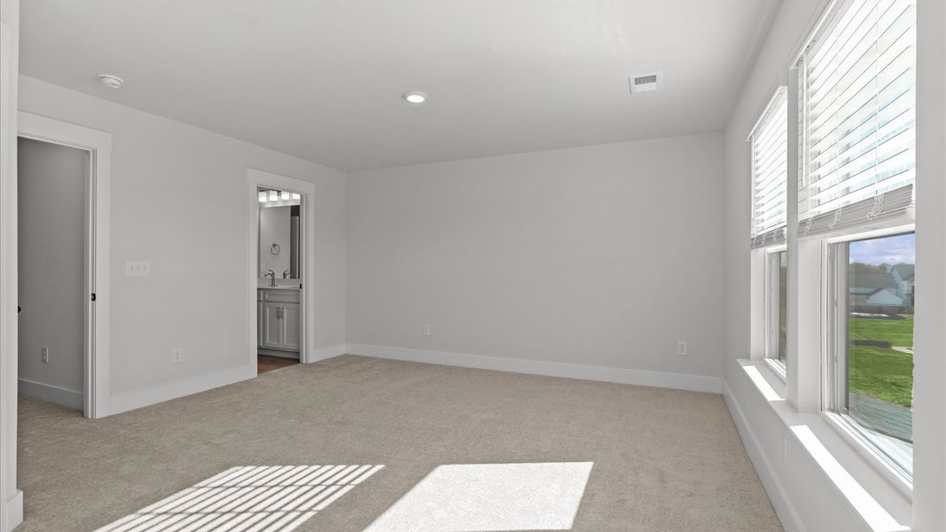 Desirable primary suite layout with spacious en suite bath in a proven, established community