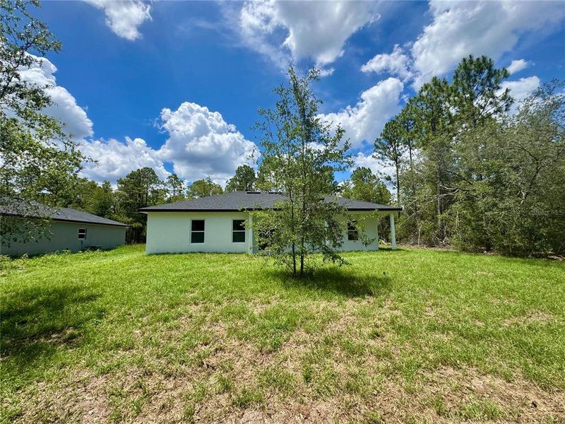 Exterior details and patio area of a home in , Citrus Springs (Image 22).