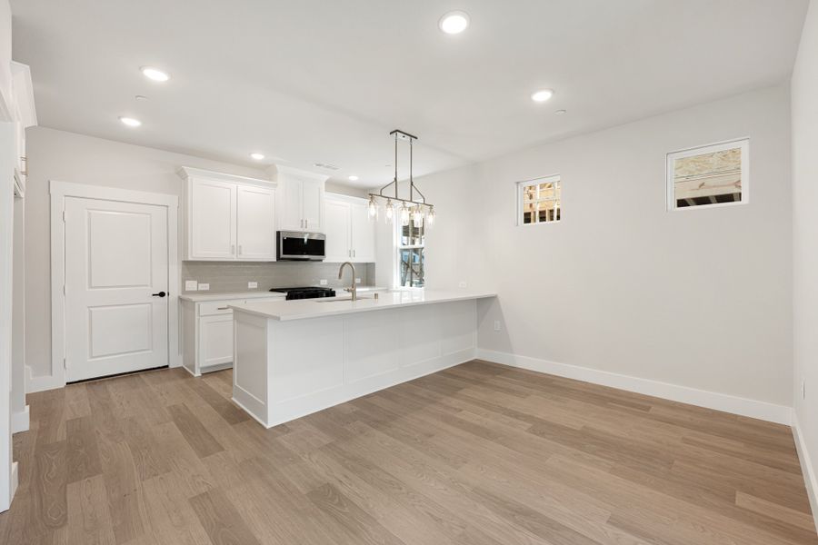 Furnished interior view inside a new home in Willow Grove Townhomes, Melissa (Image 6).