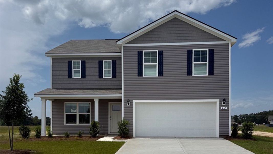 Front exterior of a new home in Dove Crossing, Conway, SC, highlighting curb appeal (Image 2).