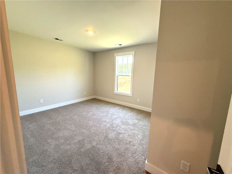 This inviting bedroom provides a comfortable and t