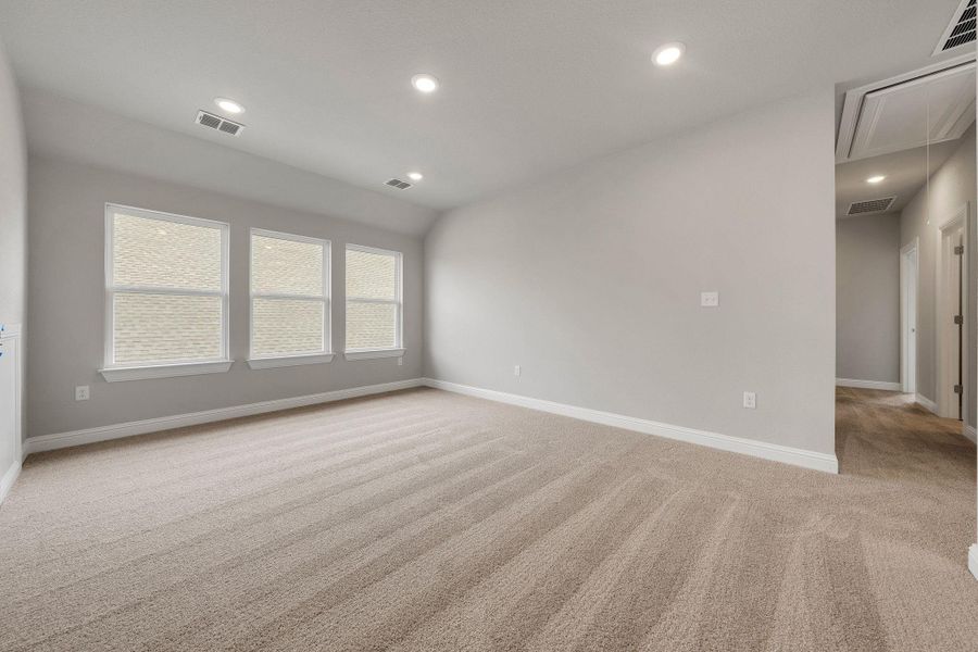 Unfurnished room featuring attic access, light colored carpet, and recessed lighting Unfurnished room featuring attic access, light colored carpet, and recessed lighting