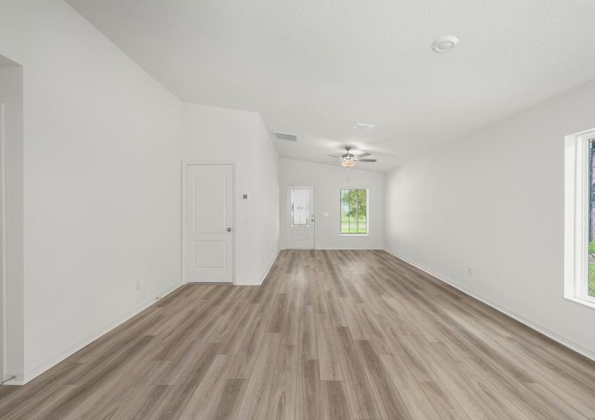 The family room has a large picture window letting in tons of natural light