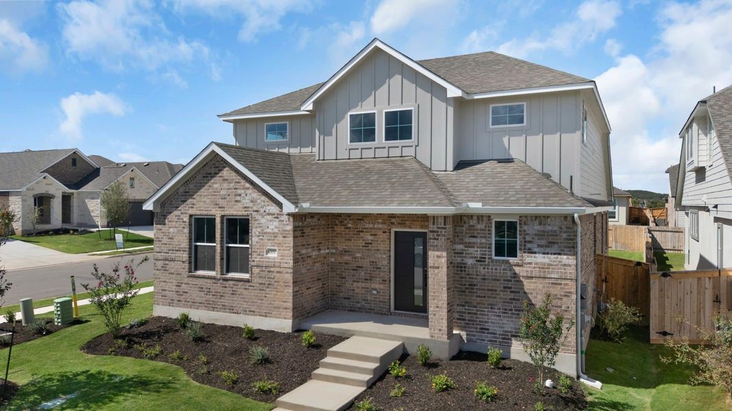 Front exterior of a new home in Nolina, Georgetown, TX, highlighting curb appeal (Image 18).