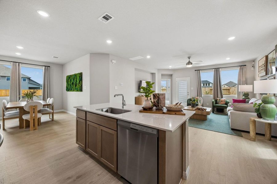 Kitchen in the Oak home plan by Trophy Signature Homes – REPRESENTATIVE PHOTO