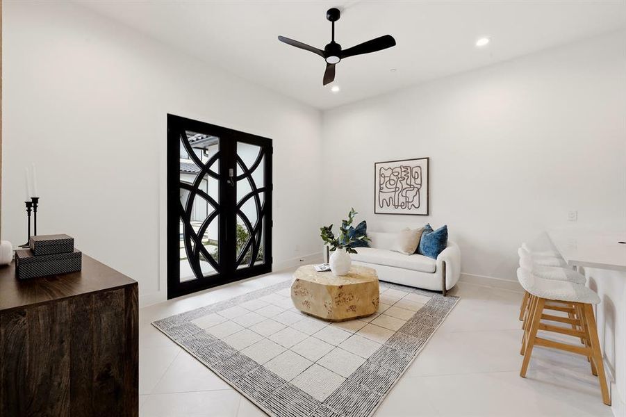 The detached casita offers unparalleled versatility as a guest or pool house, complete with a bedroom, full bath, living area, kitchen, walk-in closet, and even its own washer and dryer—perfectly independent with a private entrance.