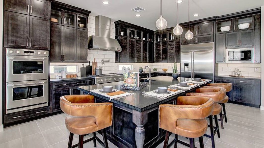 Representative furnished interior of a home built from the Shire by Taylor Morrison in Victory at Verrado Venture II Collection 55+, Buckeye (Image 12).