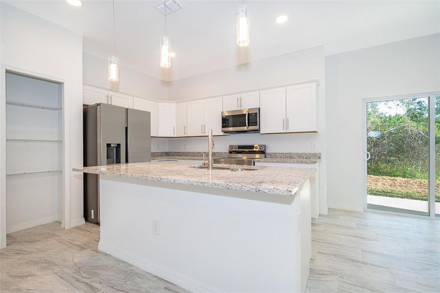 Furnished interior view inside a new home in , Kissimmee (Image 7). Furnished interior view inside a new home in , Kissimmee (Image 7).