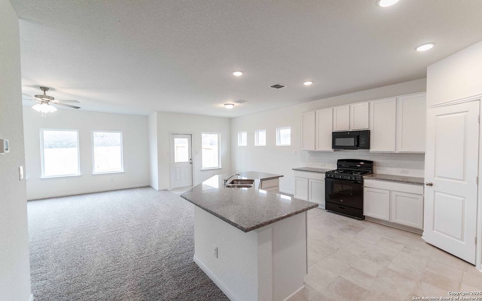 Furnished interior view inside a new home in Hunter's Ranch, San Antonio (Image 5).