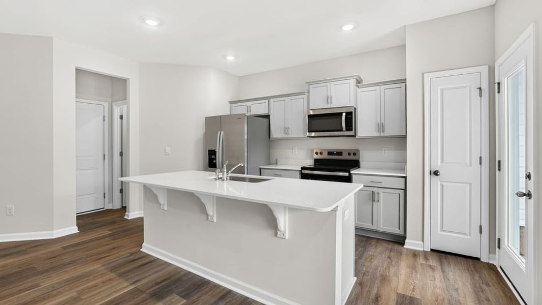 Furnished interior view inside a new home in Tanglewood Townes, Greenville (Image 9).