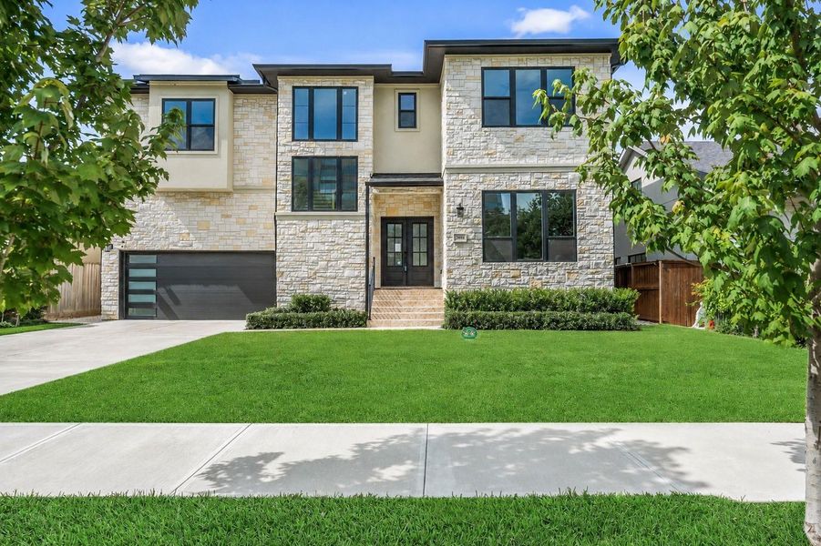 Front exterior of a new home in , Houston, TX, highlighting curb appeal (Image 2).