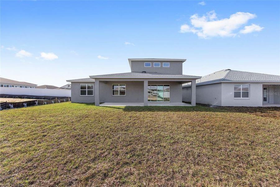 Exterior details and patio area of a home in Calesa Township, Ocala (Image 28).