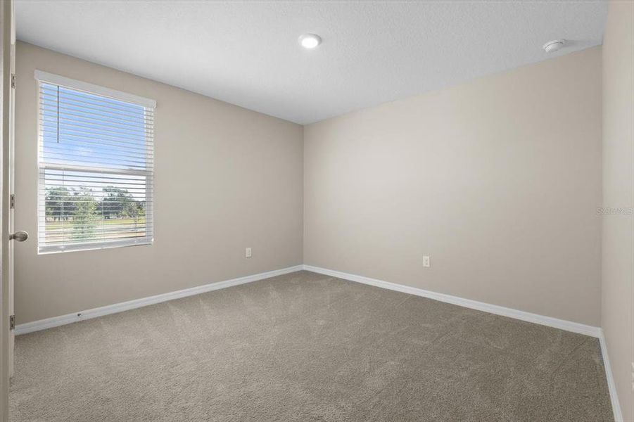 Spacious, unfurnished interior of a new home in Silverstone North, Palmetto (Image 22).