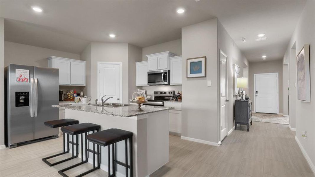 Kitchen- All Home and community information, including pricing, included features, terms, availability and amenities, are subject to change at any time without notice or obligation. All Drawings, pictures, photographs, video, square footages, floor plans, elevations, features, colors and sizes are approximate for illustration purposes only and will vary from the homes as built. Kitchen- All Home and community information, including pricing, included features, terms, availability and amenities, are subject to change at any time without notice or obligation. All Drawings, pictures, photographs, video, square footages, floor plans, elevations, features, colors and sizes are approximate for illustration purposes only and will vary from the homes as built.
