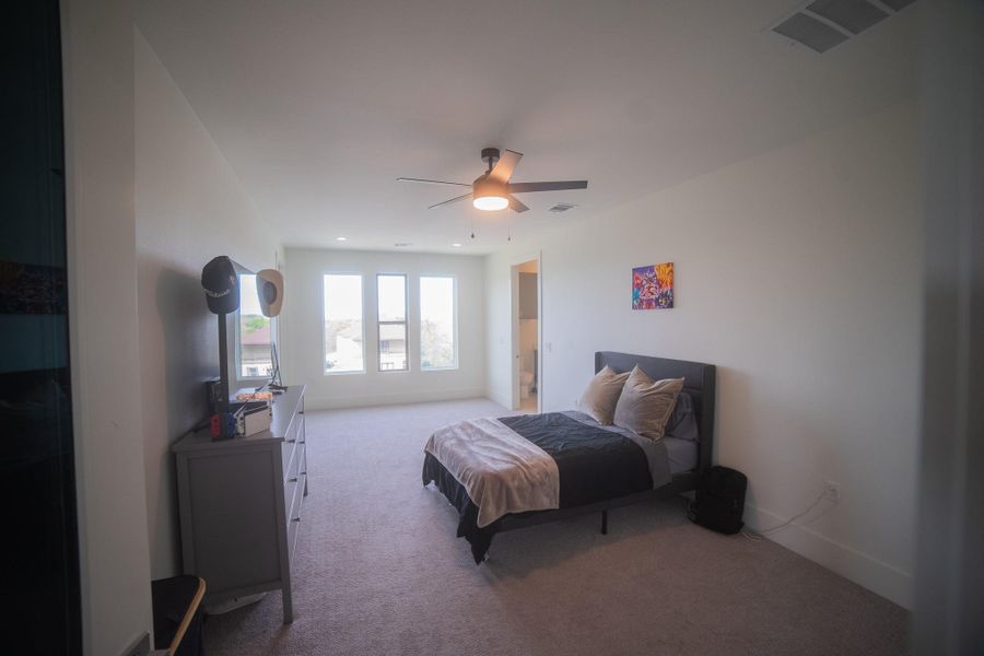 This exceptional junior suite (Bedroom 4)offers guests or family members the ultimate in privacy and comfort. Featuring oversized windows for a bright, cheerful atmosphere, the room is complete with a spacious walk-in closet and its own private full ensuite, providing a luxury hotel-like experience