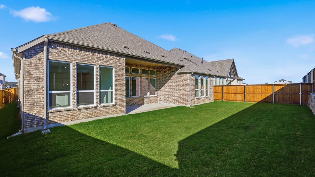 Exterior details and patio area of a home in Rio Vista at Kelly Ranch, Aledo (Image 23).