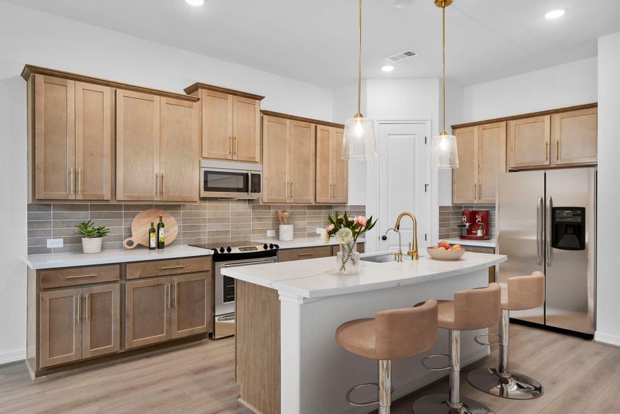Kitchen featuring the AW Collection Laguna with warm stained cabinetry, light countertops, and a modern tile backsplash for a relaxed, sun-soaked feel.