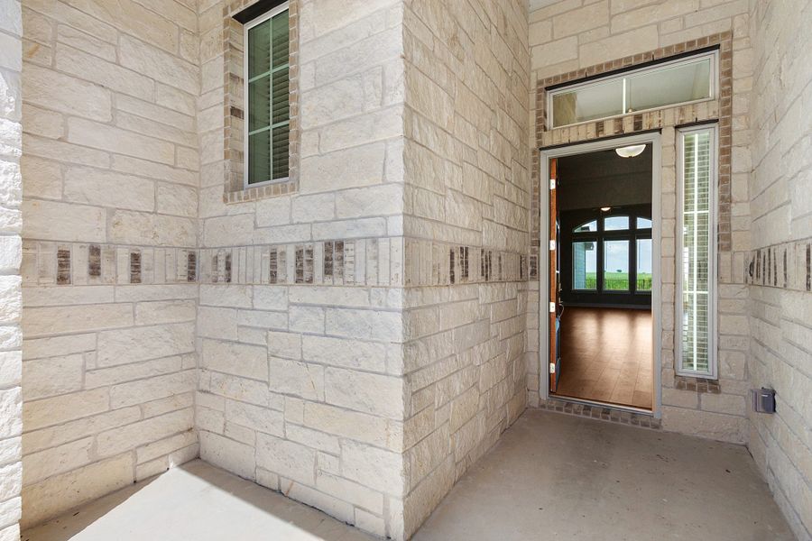Exterior details and patio area of a home in Highland Village, Georgetown (Image 4).