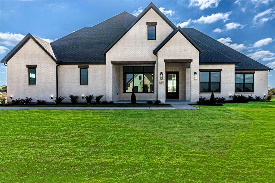 Front exterior of a new home in , Caddo Mills, TX, highlighting curb appeal (Image 22).