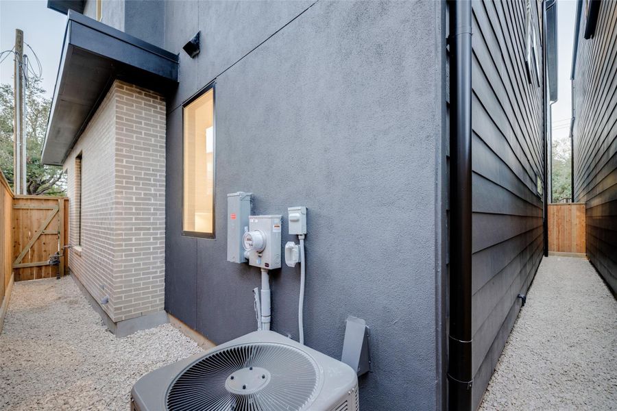 Exterior details and patio area of a home in , Houston (Image 2).