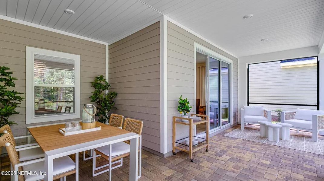 Exterior details and patio area of a home in Russell Retreat, Green Cove Springs (Image 2).