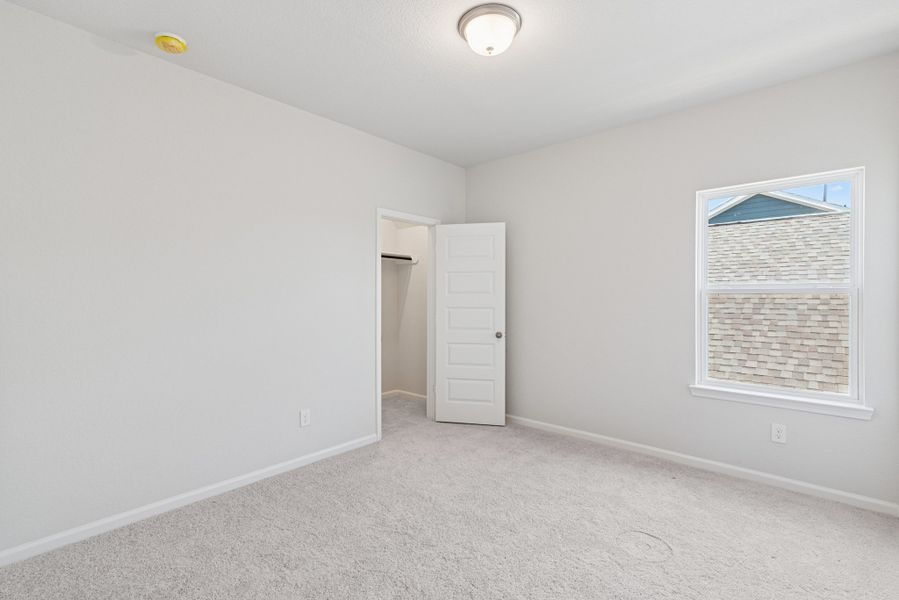 The Oriole II- Bedroom 2.Sample image to be used for example only, colors, options and upgrades vary.