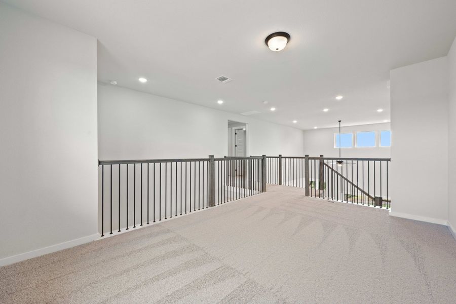 Spacious, unfurnished interior of a new home in Wolf Ranch, Georgetown (Image 38).