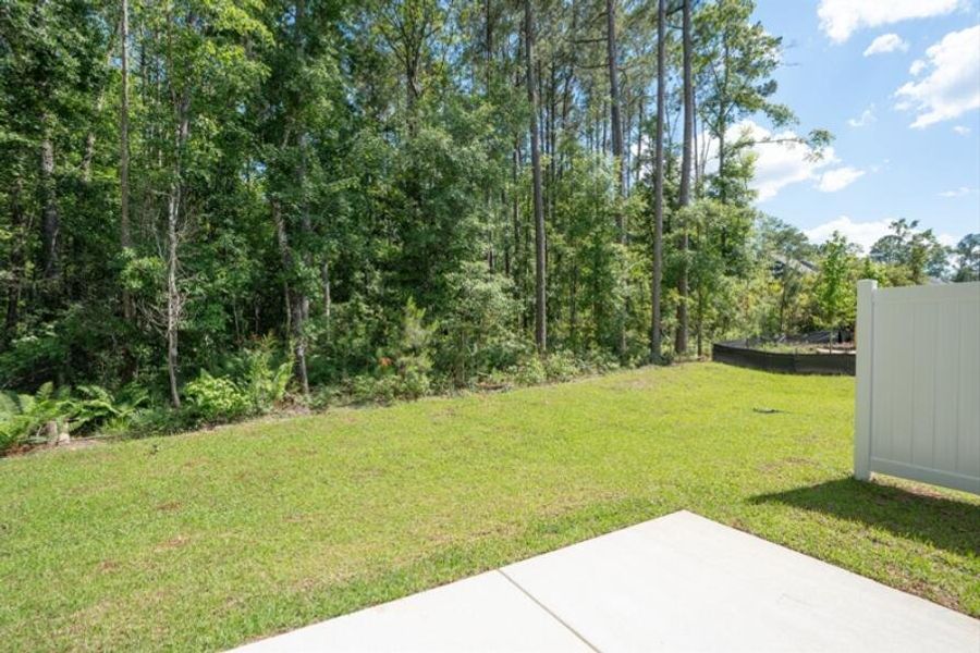Exterior details and patio area of a home in Crescent Cove, Summerville (Image 2). Exterior details and patio area of a home in Crescent Cove, Summerville (Image 2).