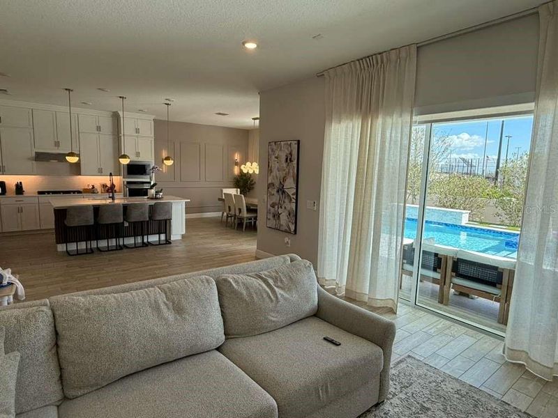 Furnished interior view inside a new home in Parkview Reserve, Orlando (Image 38).