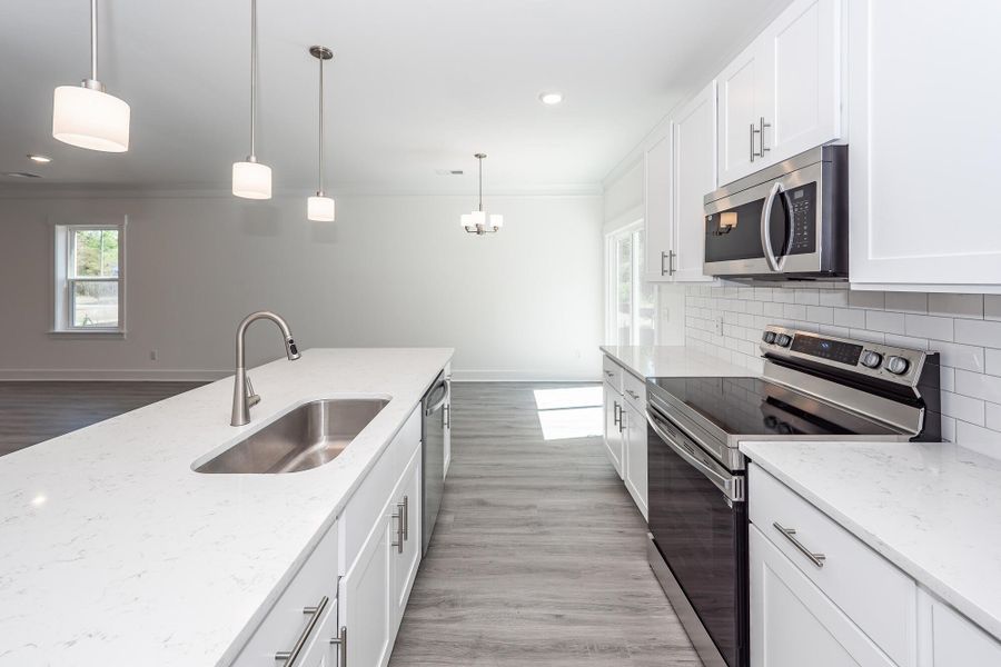 Furnished interior view inside a new home in , North Charleston (Image 10).